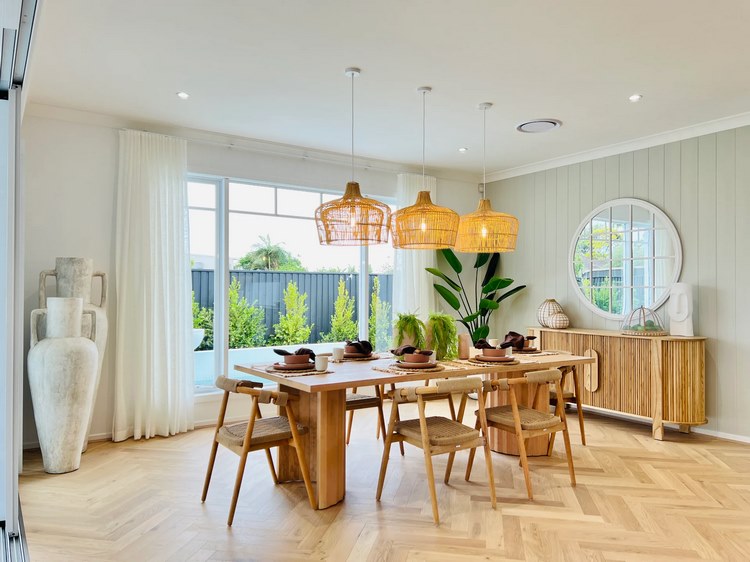 pendant lights over a dining table